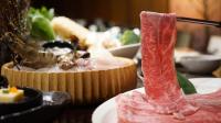 a table topped with a plate of food with a sock at The Gaia Hotel - Taipei in Taipei