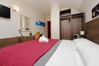 Łóżko lub łóżka w pokoju w obiekcie Gallery Home