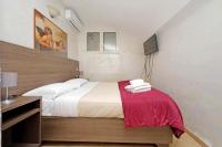 Łóżko lub łóżka w pokoju w obiekcie Gallery Home