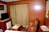 A television and/or entertainment centre at Nile Cruise Luxor Aswan 3,4 and 7 nights
