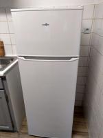 a white refrigerator in a kitchen next to a sink at Confortable appart 5 mins centre de valenciennes in Anzin