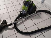 a vacuum on the floor with a hose on the floor at Confortable appart 5 mins centre de valenciennes in Anzin