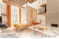 Posteľ alebo postele v izbe v ubytovaní Beauquartier - Marais, Pastourelle