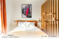 Posteľ alebo postele v izbe v ubytovaní Beauquartier - Marais, Pastourelle