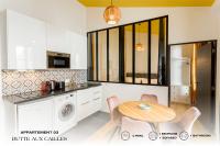 Kuchnia lub aneks kuchenny w obiekcie Beauquartier - Butte aux Cailles I