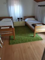 Posteľ alebo postele v izbe v ubytovaní Apartment in Mali Lošinj with Seaview, Terrace, Air condition, WIFI (3780-2)