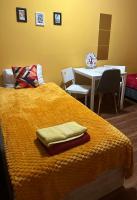 Postel nebo postele na pokoji v ubytování Travel House Wroclaw