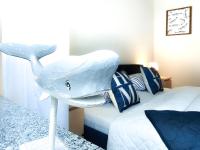 Łóżko lub łóżka w pokoju w obiekcie visit baltic - Przy Promenadzie Apartament Kapitański