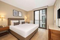 Postel nebo postele na pokoji v ubytování Tzl Suites Hotel Nişantaşı