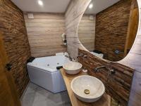 Kúpeľňa v ubytovaní La Boutame : chalet au pied des pistes à Villard Reculas