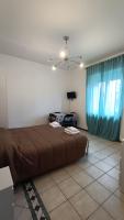 A bed or beds in a room at Pitagora