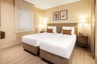 Postel nebo postele na pokoji v ubytování Tzl Suites Hotel Nişantaşı