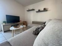 Krevet ili kreveti u jedinici u okviru objekta Appartement Spacieux avec parking priv&eacute;