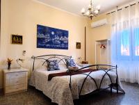 A bed or beds in a room at Attico Talenti