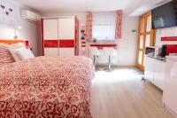 A bed or beds in a room at Balaton Fantasy Villa