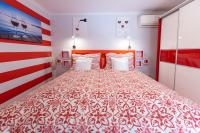 A bed or beds in a room at Balaton Fantasy Villa
