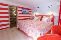 A bed or beds in a room at Balaton Fantasy Villa
