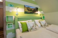 A bed or beds in a room at Balaton Fantasy Villa