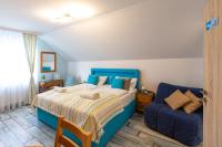 A bed or beds in a room at Balaton Fantasy Villa