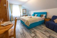 A bed or beds in a room at Balaton Fantasy Villa