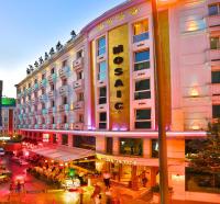 a large building with a sign on the side of it at Mosaic Hotel Old City -Special Category in Istanbul