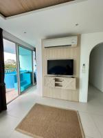 TV a/nebo společenská místnost v ubytování Costa Beach Residence & Jacuzzi