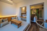 Beijing Le Zai Nan Luo Gu Xiang Wang Fu Jing Forbidden City Courtyard Hotel&Free laundry service&Free coffee &Paid Dumpling experience serviceにあるベッド