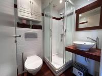 a bathroom with a shower and a toilet and a sink at Studio golfe-juan piscine plage privée tennis in Vallauris