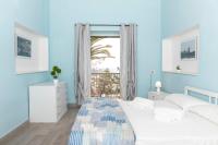 A bed or beds in a room at "Il Segreto" Vista Panoramica sulle Isole Eolie con Piscina, palestra e WiFi
