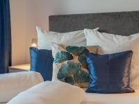 Łóżko lub łóżka w pokoju w obiekcie Ferienwohnung Emilia