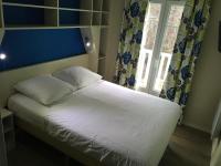 Domaine du golf lacanau Piscine chauff&eacute;e tesisinde bir odada yatak veya yataklar