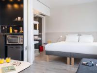 Posteľ alebo postele v izbe v ubytovaní Novotel Suites Malaga Centro