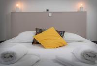 Posteľ alebo postele v izbe v ubytovaní Apartman PeTaDo