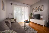 Televízia a/alebo spoločenská miestnosť v ubytovaní Apartman PeTaDo