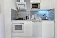 Kuchyňa alebo kuchynka v ubytovaní Market Apartman Sopron