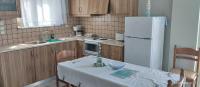 Kuchyň nebo kuchyňský kout v ubytování Riza Falasarna Apartments
