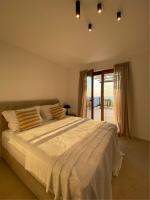 Ein Bett oder Betten in einem Zimmer der Unterkunft Belsize Villas