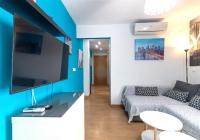 Televízia a/alebo spoločenská miestnosť v ubytovaní Apartamento Portillo