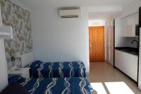 Posteľ alebo postele v izbe v ubytovaní Apartamentos Caracas