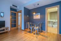 A television and/or entertainment centre at Modern and bright apartment in Eixample 2-1