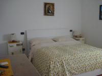 Agriturismo Val di Nappoにあるベッド