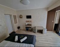 A bed or beds in a room at Guest House Simon Green