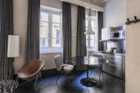 A kitchen or kitchenette at Numa Florence Palazzo Moro