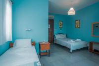 A bed or beds in a room at House Christina