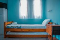 A bed or beds in a room at House Christina