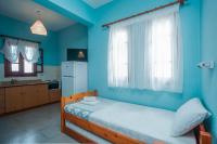 A bed or beds in a room at House Christina