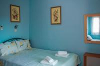 A bed or beds in a room at House Christina