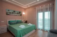 A bed or beds in a room at House Christina