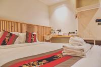 Postel nebo postele na pokoji v ubytování LA PINO HOTEL