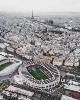 an aerial view of a soccer stadium with the eiffel tower at Appartement chic proche gare de Clamart + Netflix in Malakoff